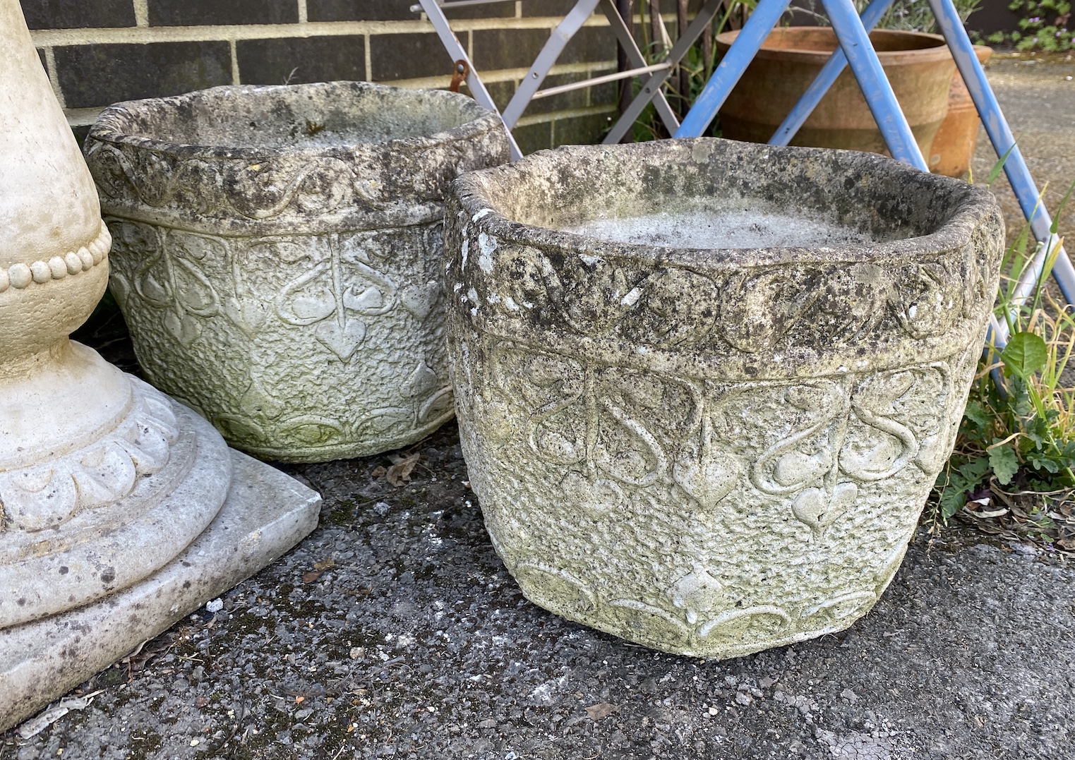 A pair of Cotstone octagonal Art Nouveau style garden planters, width 34cm, height 28cm *Please note the sale commences at 9am.